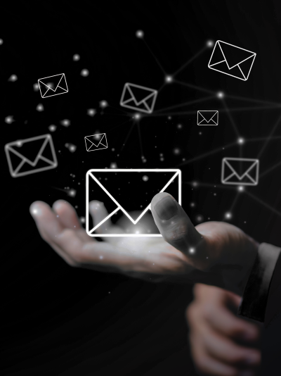 People collaborating with laptops and notes